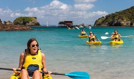 YHA Bay of Islands the Rock youth travelers forming a kayak pack from cruise