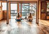 YHA Raglan yoga room with youth travelers balancing chi