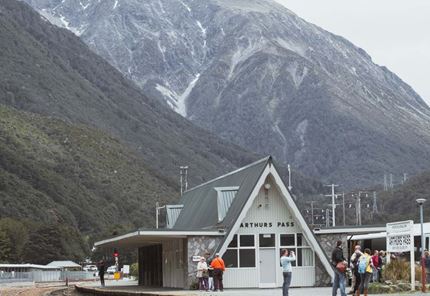 yha arthurs pass train station with mountain backdrop