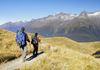 YHA Te Anau travellers on routeburn track heading into valley