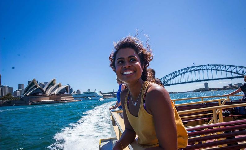 YHA Australia - woman on the ferry in Sydney Harbour