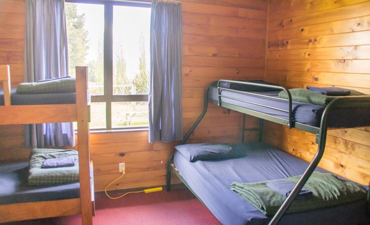 YHA Waitomo family room with double bed and bunks