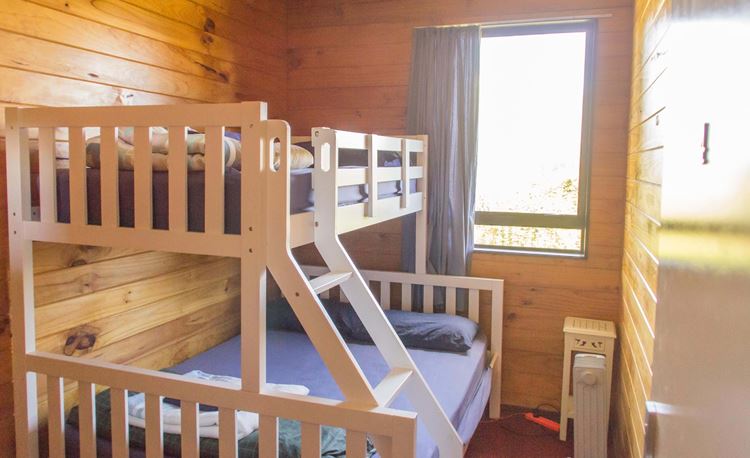 YHA Waitomo double bed underneath single bunk bed